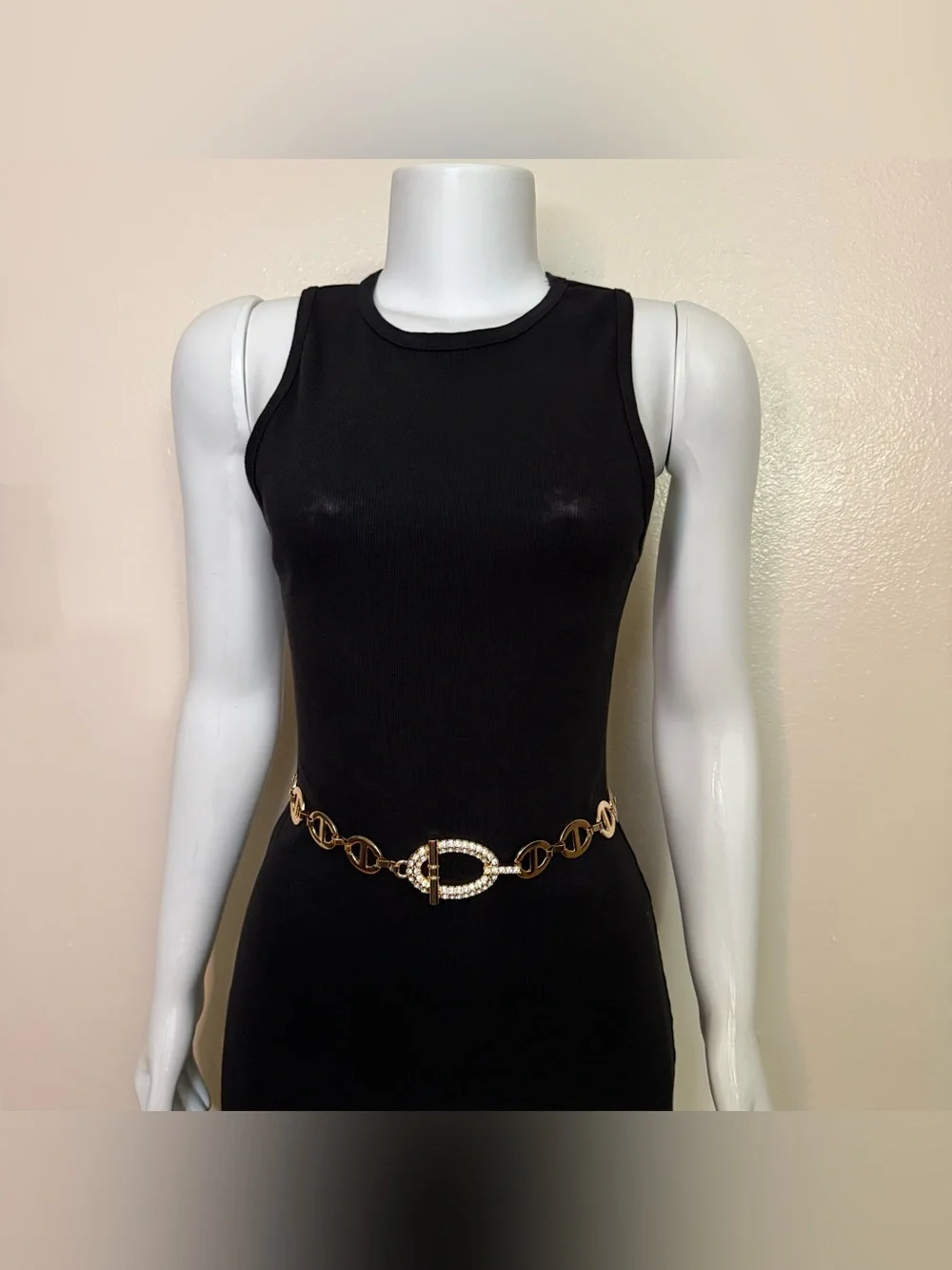 Gold tone metal chain belt with rhinestone details